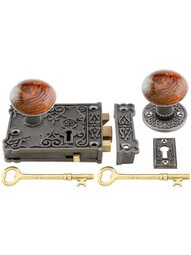 Cast Iron Century Rim Lock Set with Brown Swirl Porcelain Knobs in