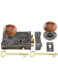 Cast Iron Century Rim Lock Set with Brown Swirl Porcelain Knobs