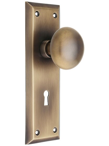 New York Mortise-Lock Set with Round Brass Knobs in Antique-By-Hand.
