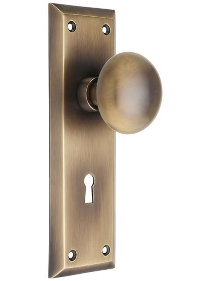 New York Mortise-Lock Set with Round Brass Knobs in Antique-By-Hand.
