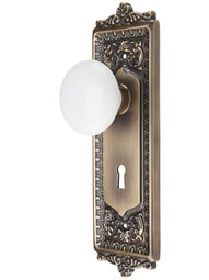 Egg & Dart Design Mortise-Lock Set with White Porcelain Knobs in Antique-By-Hand