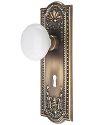 Meadows Design Mortise-Lock Set with White Porcelain Knobs in Antique-By-Hand.