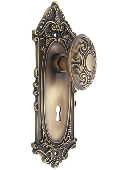 Largo Design Mortise-Lock Set with Decorative Oval Knobs in Antique-By-Hand.