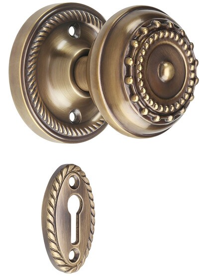 Rope Rosette Mortise-Lock Set with Meadows Design Knobs in Antique-By-Hand.