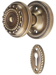Rope Rosette Mortise-Lock Set with Meadows Design Knobs in Antique-By-Hand.