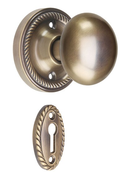Rope Rosette Mortise-Lock Set with Round Brass Knobs in Antique-By-Hand.