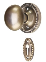 Rope Rosette Mortise-Lock Set with Round Brass Knobs in Antique-By-Hand.