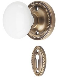 Rope Rosette Mortise-Lock Set with White Porcelain Knobs in Antique-By-Hand