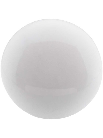 Alternate View of Pair of White Porcelain Rim Lock Knobs with Black Iron Shanks - 1 3/4 inch Diameter.
