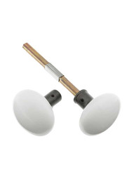 Pair of White Porcelain Rim Lock Knobs With Solid Iron Shanks In Antique Iron.