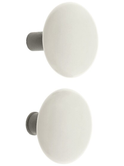 Alternate View 2 of Pair of White Porcelain Rim Lock Knobs With Solid Iron Shanks In Antique Iron.