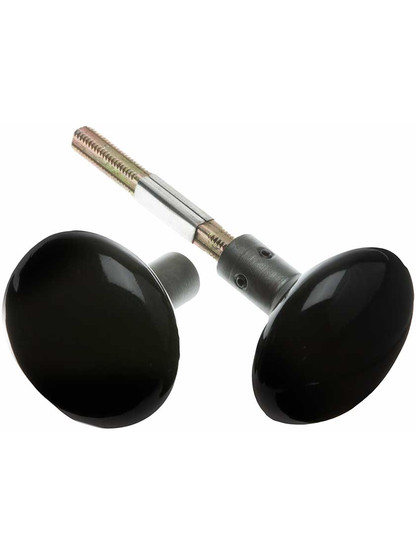 Pair of Black Porcelain Doorknobs With Antique Iron Shanks