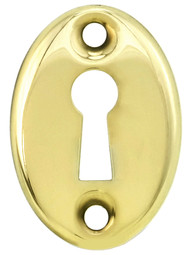 Stamped Brass Oval Keyhole Cover.