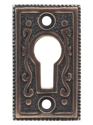 Solid-Brass Ornate Keyhole Cover in Antique-By-Hand