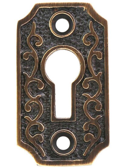 Solid-Brass Scroll Keyhole Cover in Antique-by-Hand.