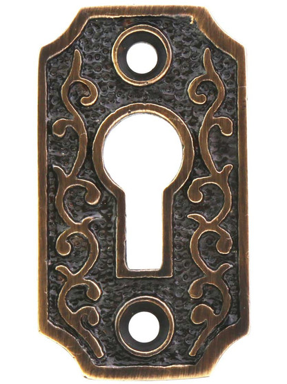 Solid-Brass Scroll Keyhole Cover in Antique-by-Hand