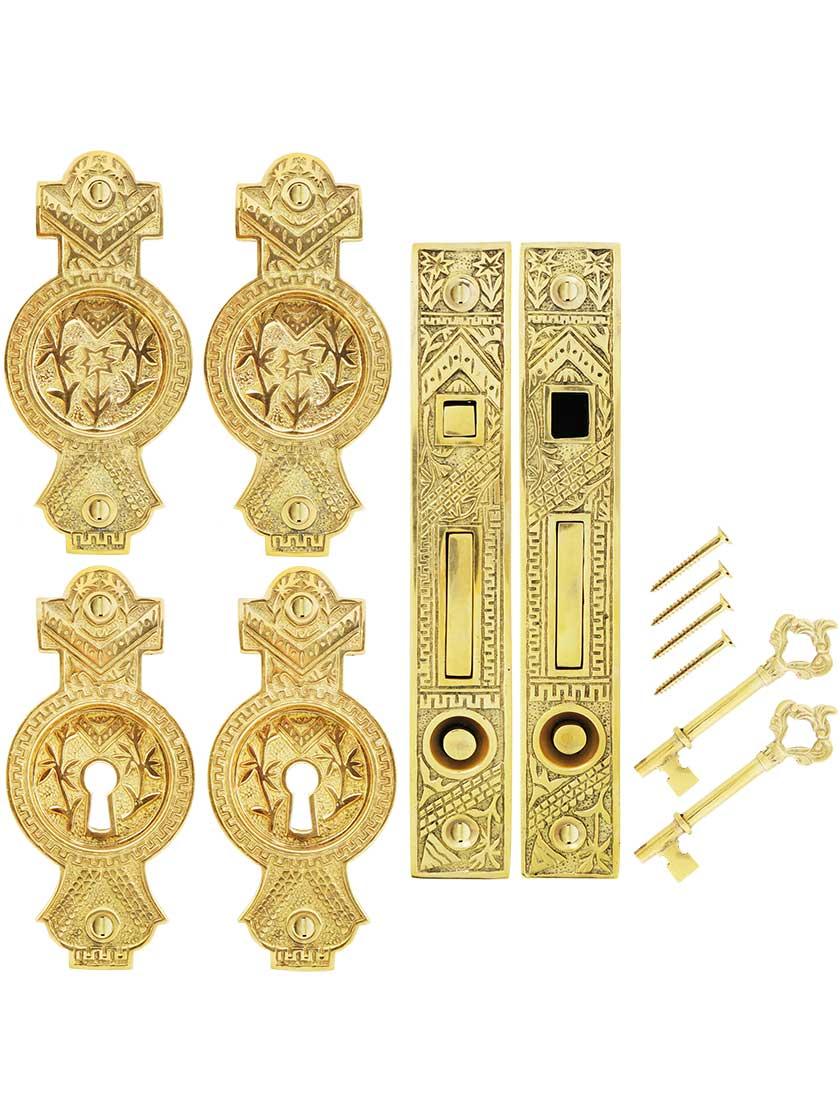 Alternate View of Oriental Bit-Key Double Pocket Door Mortise-Lock Set in Unlacquered Brass.
