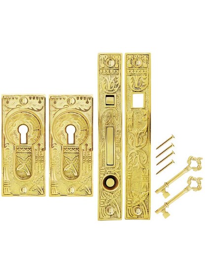 Alternate View of Broken Leaf Bit-Key Single Pocket Door Mortise-Lock Set in Unlacquered Brass.