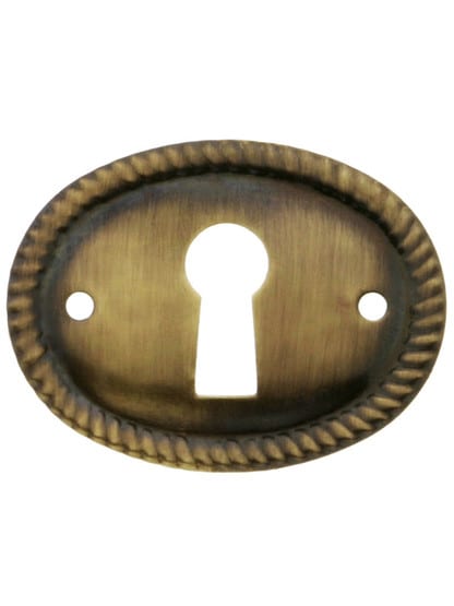 Horizontal Oval Keyhole Cover with Rope Design in Antique-By-Hand Finish.