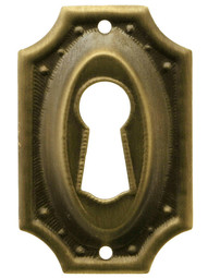 Stamped Brass Colonial Revival Keyhole Cover in Antique-By-Hand Finish
