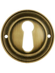 Round Stamped-Brass Keyhole Cover in Antique-By-Hand