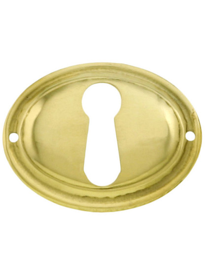 Oval Horizontal Stamped Brass Keyhole Cover.