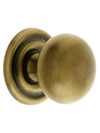 Round Brass Cabinet Knob With Rosette in Antique-By-Hand - 1 1/4 inch Diameter