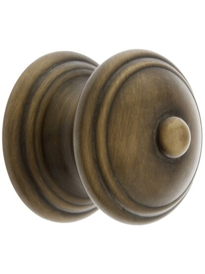 Traditional Brass Cabinet Knob in Antique-By-Hand - 1 1/4 inch Diameter.