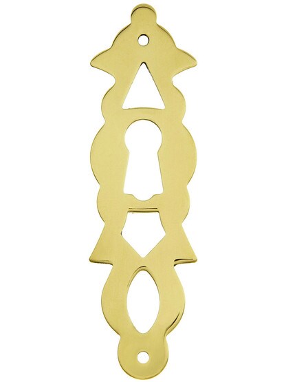 Chippendale Vertical Keyhole Escutcheon In Unlacquered Brass.