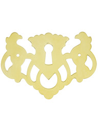 Chippendale Griffin Keyhole Cover In Unlacquered Brass.