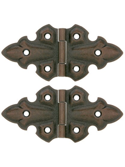 Pair of Gothic Style Surface Cabinet Hinges - 1 3/4 inch H x 3 3/4 inch W in Bronze.