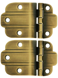 Pair of Solid Brass 3/8 inch Offset Deco Style Cabinet Hinges in Antique-By-Hand Finish.