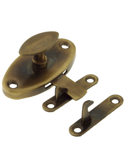 Solid Brass Reversible Oval Hoosier Latch in Antique-By-Hand.