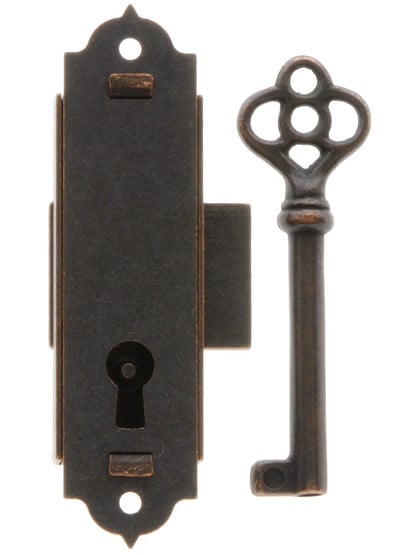 Narrow Vertical Cabinet Lock With Antique Bronze Finish.