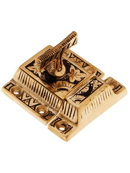 Solid Bronze Oriental Pattern Turn Latch With Highlighted Antique Finish.