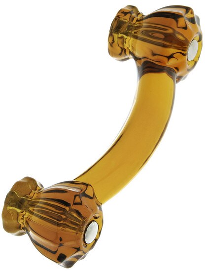 Fluted Amber Glass Bridge Drawer Pull With Nickel Bolts.