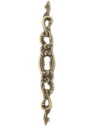 Right Vertical Swirl-Pattern Keyhole Escutcheon.