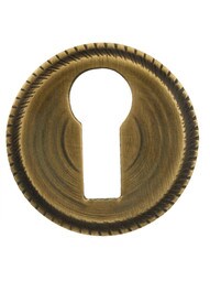 Round Brass Push In Keyhole Cover In Antique By Hand.