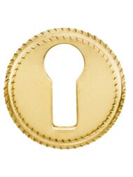 Round Notched-Border Brass Push-In Keyhole Cover