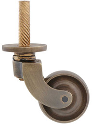 Solid Brass English-Style Caster with 1 1/4 inch Brass Wheel in Antique-By-Hand.