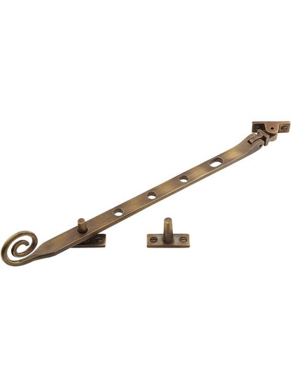 Solid-Brass Casement Stay with Curly Handle - 11 1/2 inch in Antique-By-Hand.