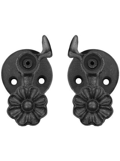 Alternate View of Pair of Cast Iron Sun Flower Shutter Dogs - Post Mounted.