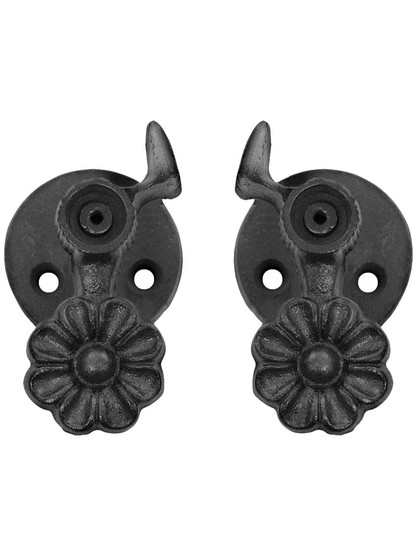 Alternate View of Pair of Cast Iron Sun Flower Shutter Dogs - Post Mounted.