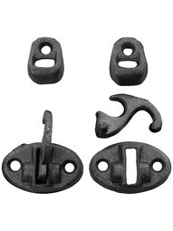 Pair of Cast Iron Sill Mounted Shutter Fasteners With Raw Iron Finish
