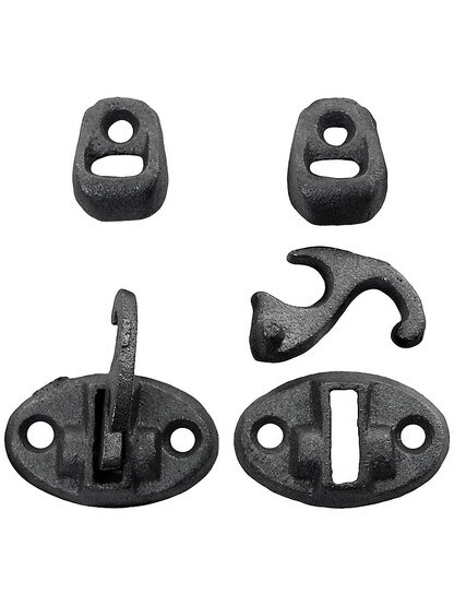 Pair of Cast Iron Sill Mounted Shutter Fasteners With Raw Iron Finish