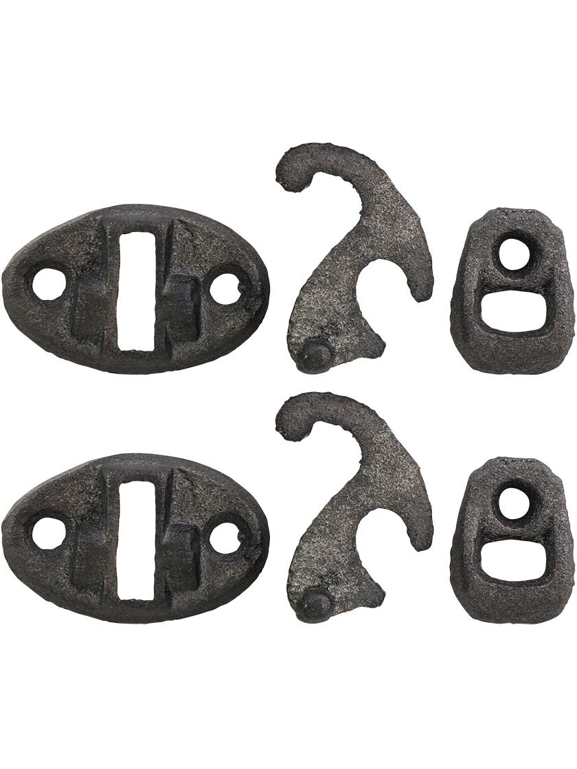 Pair of Cast Iron Sill Mounted Shutter Fasteners With Raw Iron Finish