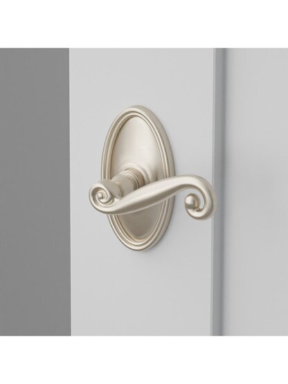 Oval Rosette Set With Scroll Design Levers