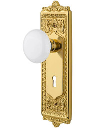 Egg and Dart Door Set with White Porcelain Knobs and Keyhole.