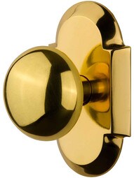 Arched Rosette Door Set with Classic Round Knobs.