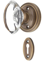 Classic Rosette Mortise-Lock Set with Oval Crystal Glass Knobs in Antique-By-Hand.